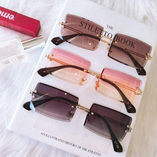 Fashion Rimless Women Trendy Small Rectangle Sunglasses With High Quality metal frame And UV400 Protection