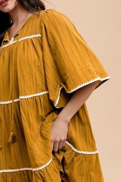 Tassel Contrast Trim Tie Neck Half Sleeve Tiered Dress For Women – Bohemian Inspired Tiered Dress with Tassel Accents and Contrast Trim for a Playful Look