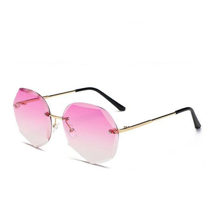 Classic Rimless Sunglasses Women Metal Frame Diamond Cutting Lens Sunglasses For Women New Fashion Black Color New Retro Sun Glasses For Women New Summer Style Sun glasses For Female Famous Style Frames